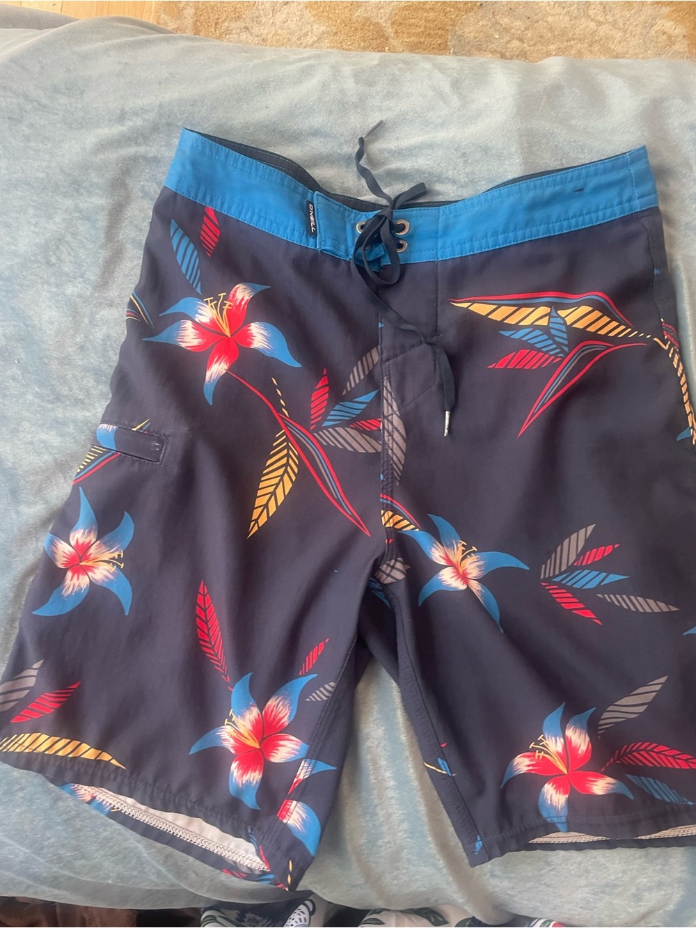 O'Neill Navy Swim Trunks with Blue Waistband and Tropical Floral Print